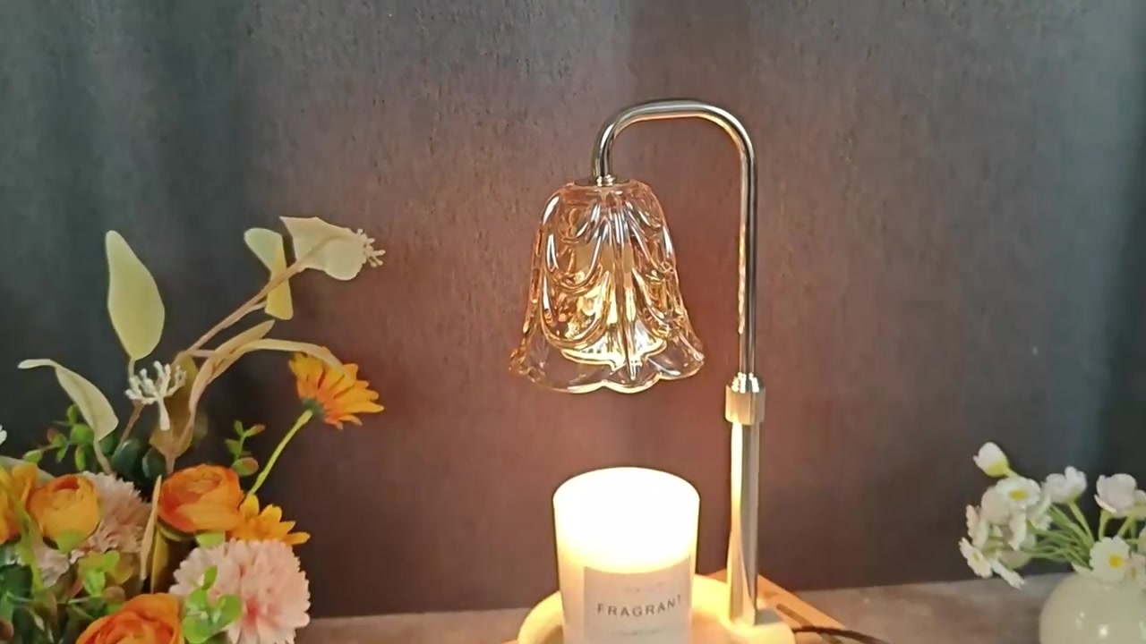 Halo candle warmer with a glass shade on a side table